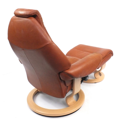 6 - Brown leather Stressless chair and foot stool