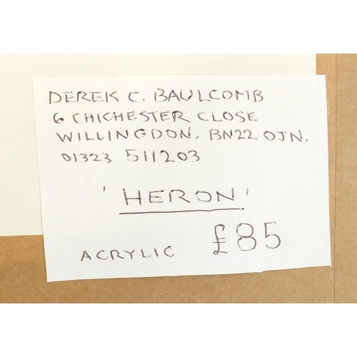 68 - Derek C Balucomb 2009 acrylic of a Heron in a pond, 37cm x 26cm excluding the mount and frame