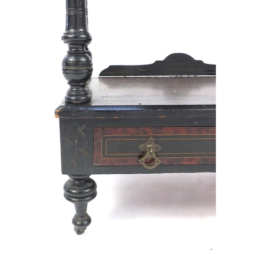 4 - Victorian ebonised and amboyna inlaid three tier wotnot fitted with a base drawer, 105cm high