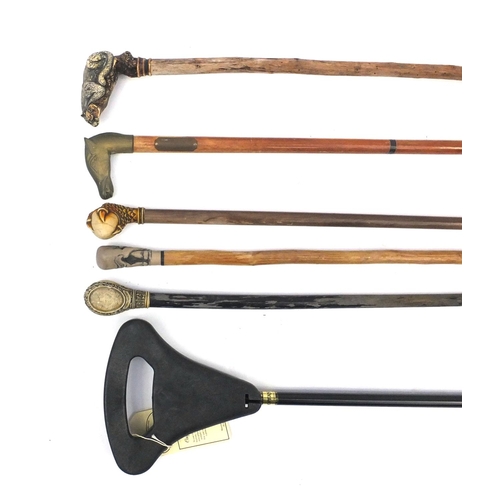 157 - Five wooden walking canes together with a shooting stick