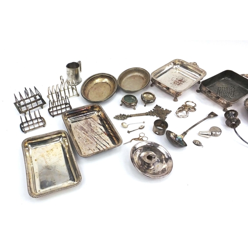 196 - Silver plated items including a lidded entrée dish, toast racks, salts etc