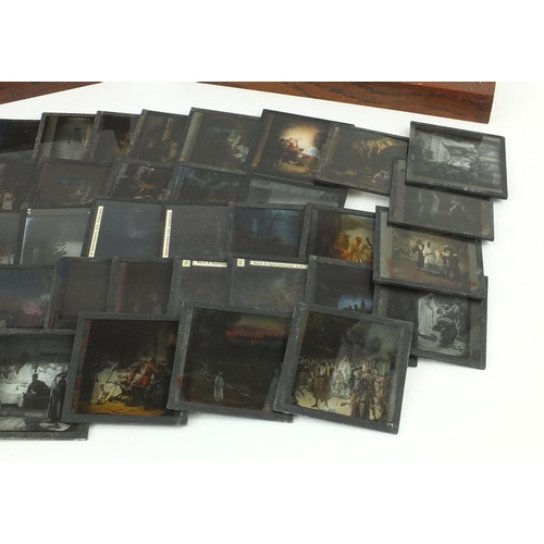 421 - Box of glass magic lantern slides including coloured examples