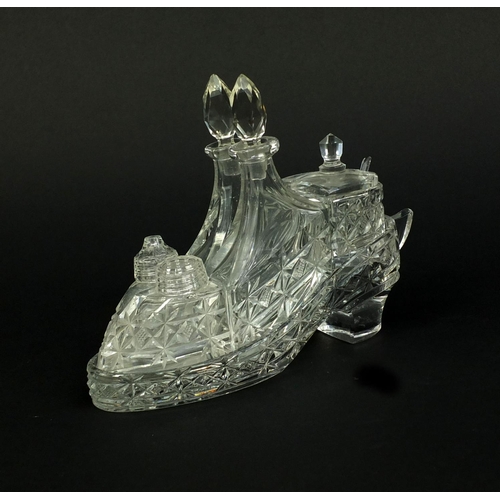 2104 - Novelty cut glass cruet set in the form of a shoe, 13cm high