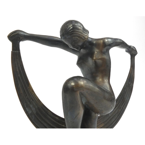 145 - Bronze figure of a nude Art Deco lady dancer, 24cm high