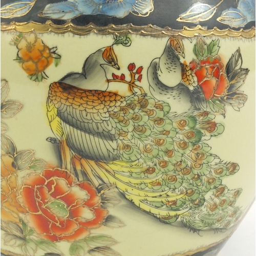 268 - Chinese porcelain planter decorated with peacocks and fish, 25cm high x 32cm in diameter