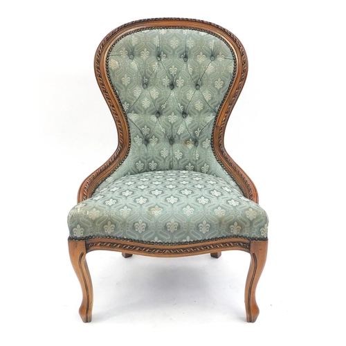 75 - Carved walnut bedroom chair with green button back upholstery