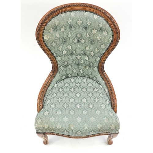 75 - Carved walnut bedroom chair with green button back upholstery