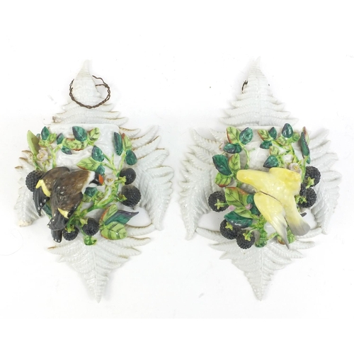 176 - Pair of continental porcelain bird wall pockets