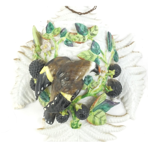 176 - Pair of continental porcelain bird wall pockets