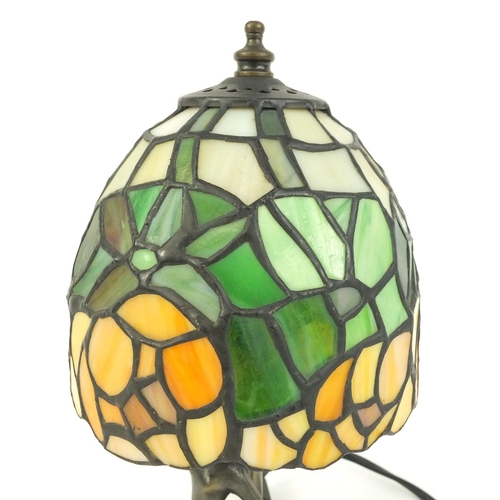 159 - Bronzed Tiffany design table lamp and shade with figural column, 24cm high