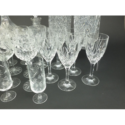 241 - Collection of glassware including sets of glasses and decanters etc