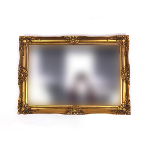 2039 - Rectangular gilt framed bevelled edge mirror, 89cm x 63cm