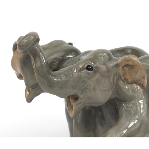 2063 - Royal Copenhagen study of two elephants, factory marks and numbered 802 to the base, 18cm high