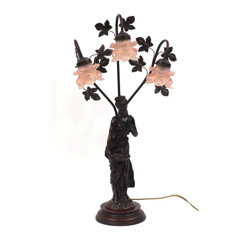 2117 - Large Art Nouveau style figural three branch table lamp with pink glass frilled shades, 82cm high