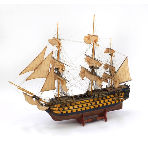 2233 - Wooden model of HMS Victory with canvas sail on stand, 78cm high