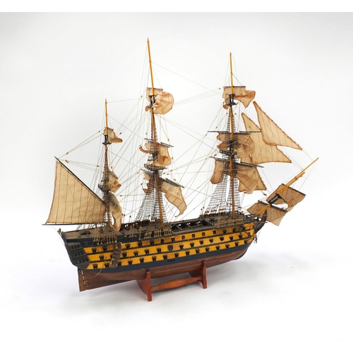 2233 - Wooden model of HMS Victory with canvas sail on stand, 78cm high