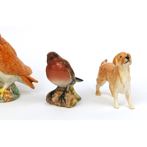 2083 - Five Beswick animals comprising Robin 980, an owl and three dogs, each with factory marks to the bas... 