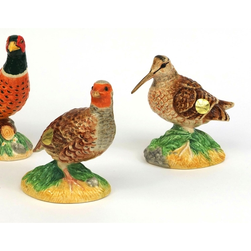 2082 - Four John Beswick birds including a Pheasant and a Quail, two with original paper labels, each with ... 