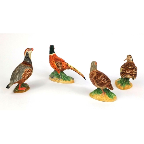 2082 - Four John Beswick birds including a Pheasant and a Quail, two with original paper labels, each with ... 