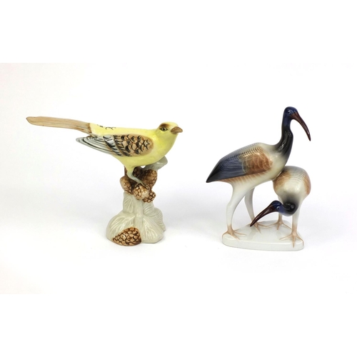 2095 - Royal Dux study of a bird perched on a ranch together with a Holland bird, each with factory marks t... 