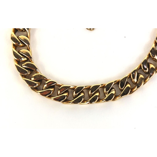 2437 - 9ct gold curb link bracelet, 18cm long, approximate weight 32.3g