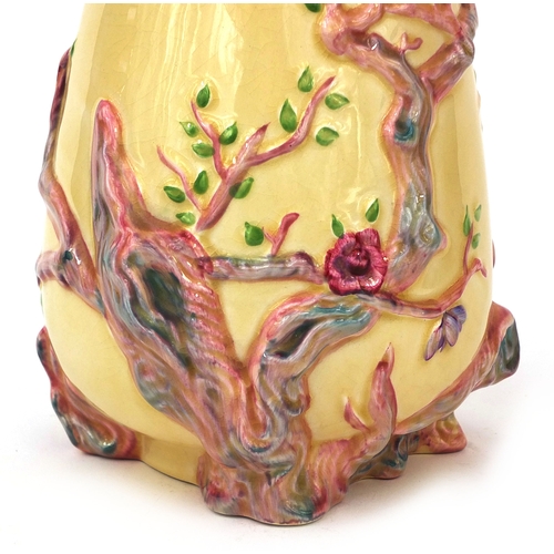 2120 - Clarice Cliff Newport pottery vase, decorated and hand painted in relief with blossoming trees, fact... 