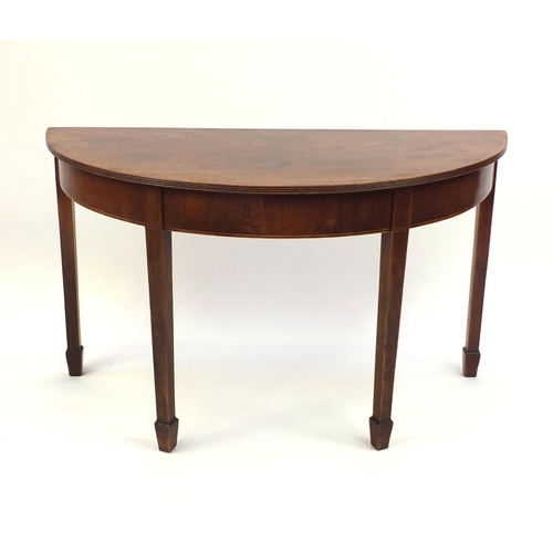2024 - Georgian mahogany demi lune side table, with reeded edge on tapering legs, 70cm high x 121cm wide