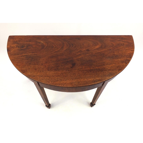 2024 - Georgian mahogany demi lune side table, with reeded edge on tapering legs, 70cm high x 121cm wide