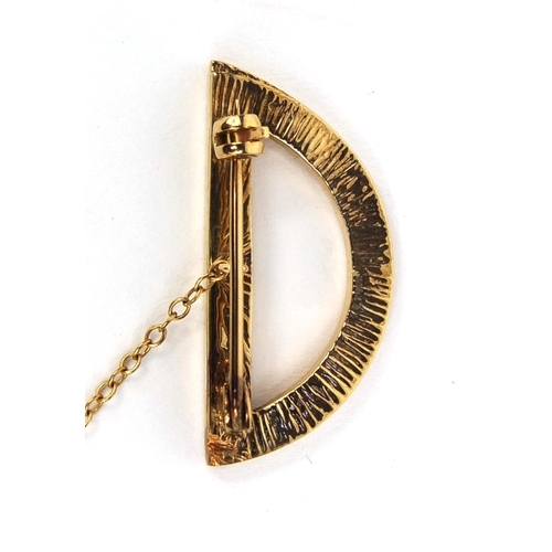 2446 - Unmarked gold diamond initial D brooch, set with twenty one diamonds, 3.2cm long, approximate weight... 