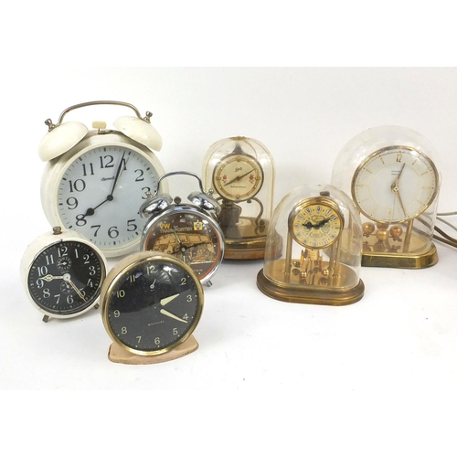 208 - Selection of clocks and clock parts, some under domes