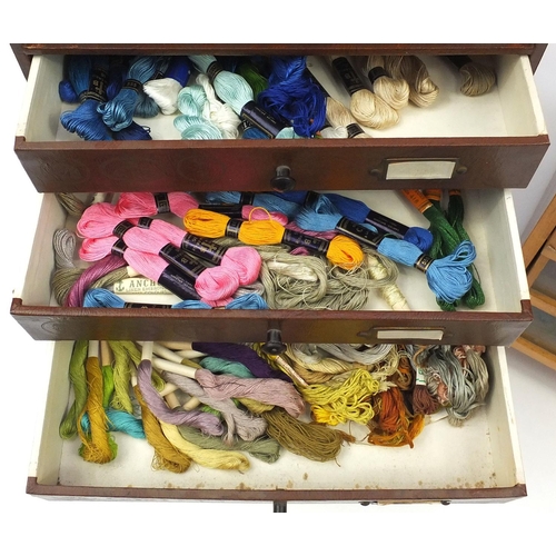 206 - Two vintage sewing accessory chests with a large selection of cotton and other thread