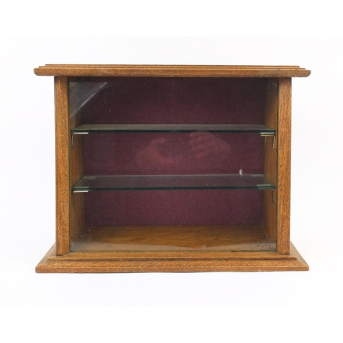 50 - Oak table top display cabinet with glass shelves, 35cm high x 46cm wide x 22cm deep