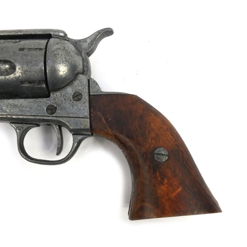 641 - Two decorative flintlock pistols and a revolver, the larger 37cm long