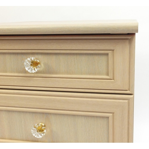 51 - Pair of modern limed oak three drawer bedside chests, 67cm high x 51cm wide x 50cm deep