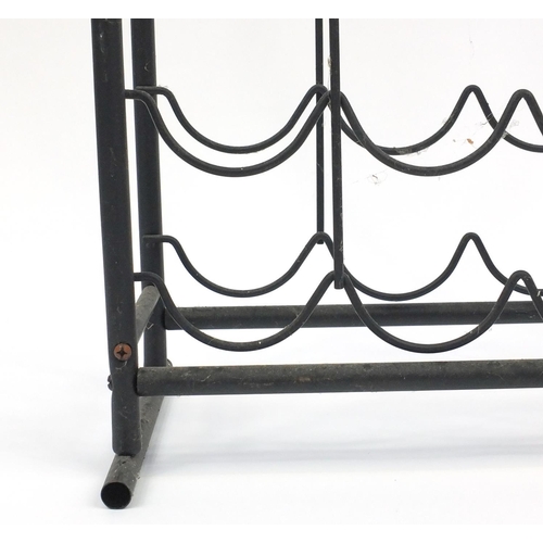 89 - Fifty two bottle metal wine rack, 143cm high