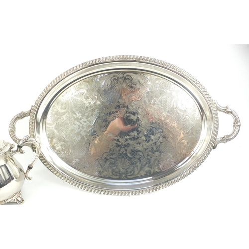 231 - Silver plated four piece tea service and a large silver plated oval tray, 66cm long