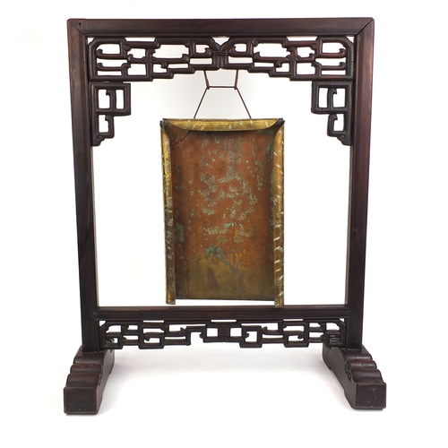 2054 - Chinese carved hardwood dinner gong, with Townshend & Co brass gong, the hardwood frame with stylise... 