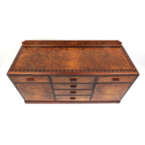 2045 - Art Deco burr walnut sideboard with padauk wood banding, fitted with an arrangement of drawers and c... 