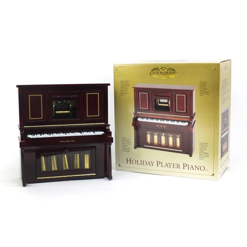 400 - Boxed gold label collection holiday player piano musical box, 25cm x 23cm wide x 12cm deep