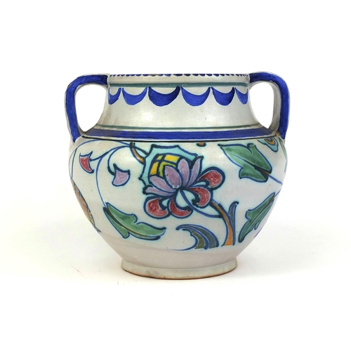 407 - Honiton pottery twin handled jar, hand painted with stylised flowers, impressed factory marks to the... 