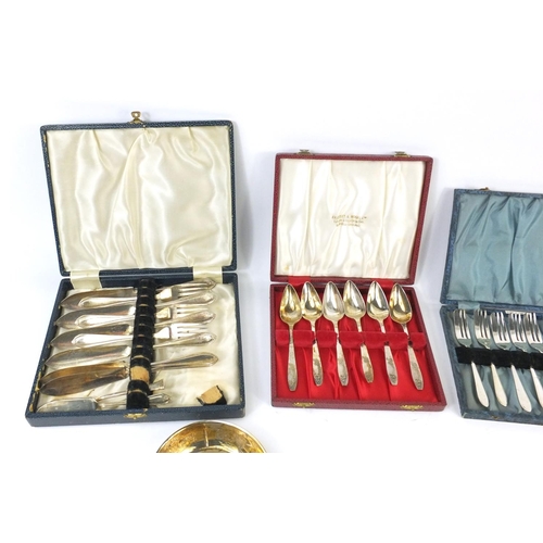 240 - Large selection of mostly silver plated and stainless steel cutlery, some with ivorine handles and c... 