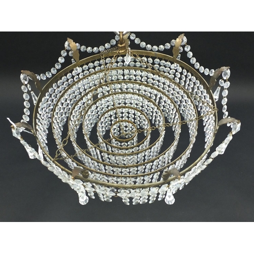 101 - Brass and glass six tier chandelier, 38cm in diameter