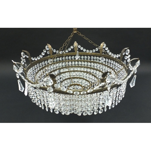 101 - Brass and glass six tier chandelier, 38cm in diameter