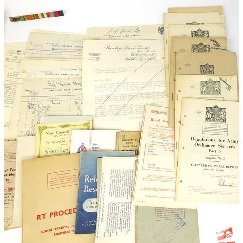 653 - Box of Military interest ephemera including cheques, regulations for army ordnance services, an enam... 