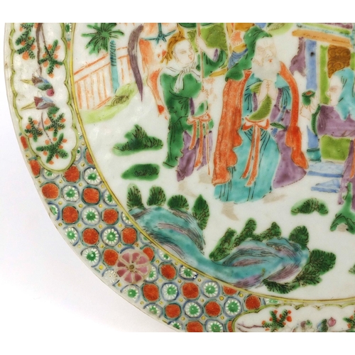 481 - Circular Chinese Canton porcelain panel, hand painted in the famille rose palette with figures in a ... 