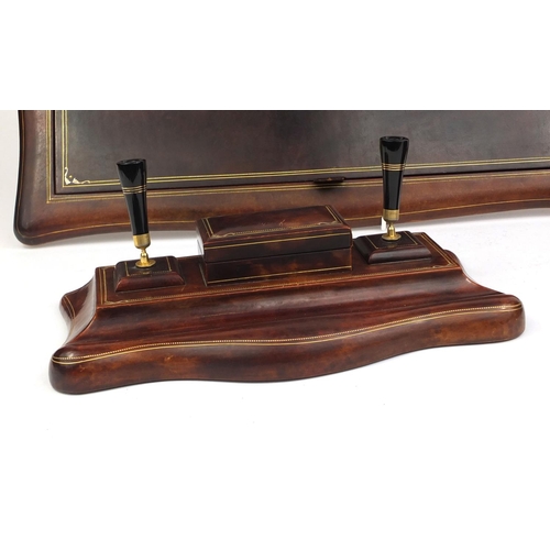 37 - Asprey of London three piece tooled leather desk set comprising pen stand, writing pad and tray, eac... 