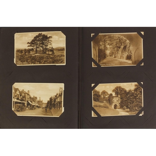 205 - Postcard album including Military, shipping and topographical examples, ones titled Infantry firing ... 