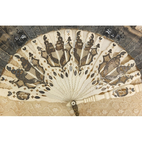 86 - 19th century hand coloured fan, with bone sticks, decorated with classical figures in an exterior am... 