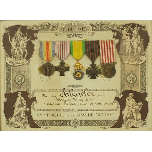 355 - Two framed displays of World War I French medals awarded to Caporal Coste Louis, each 39cm x 29cm ex... 