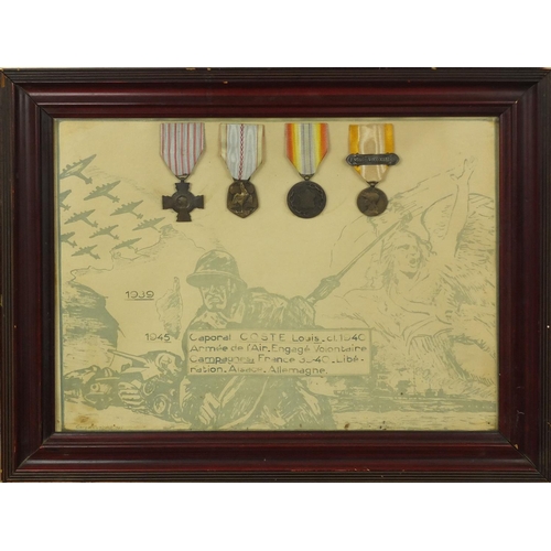 355 - Two framed displays of World War I French medals awarded to Caporal Coste Louis, each 39cm x 29cm ex... 